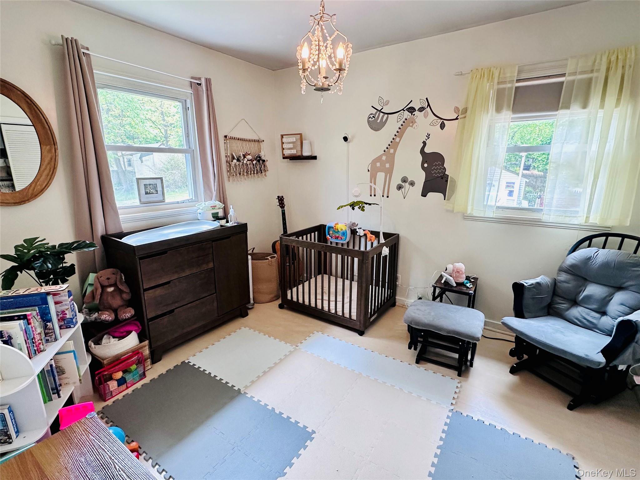 15 Pops Road Cortlandt Manor, NY 10567 - Photo 11 of 14 a bedroom with furniture and a window