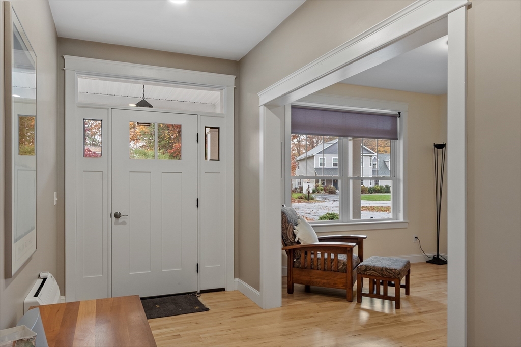 243 Gates Pond Road Berlin, MA 01503 - Photo 17 of 40 a living room with furniture and a window