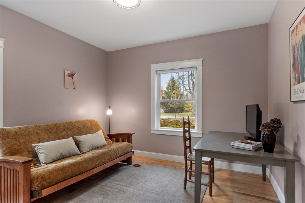 243 Gates Pond Road Berlin, MA 01503 - Photo 30 of 40 a living room with furniture and a window