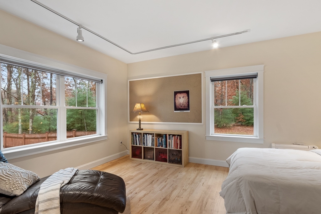 243 Gates Pond Road Berlin, MA 01503 - Photo 31 of 40 a bed room with a bed and a window