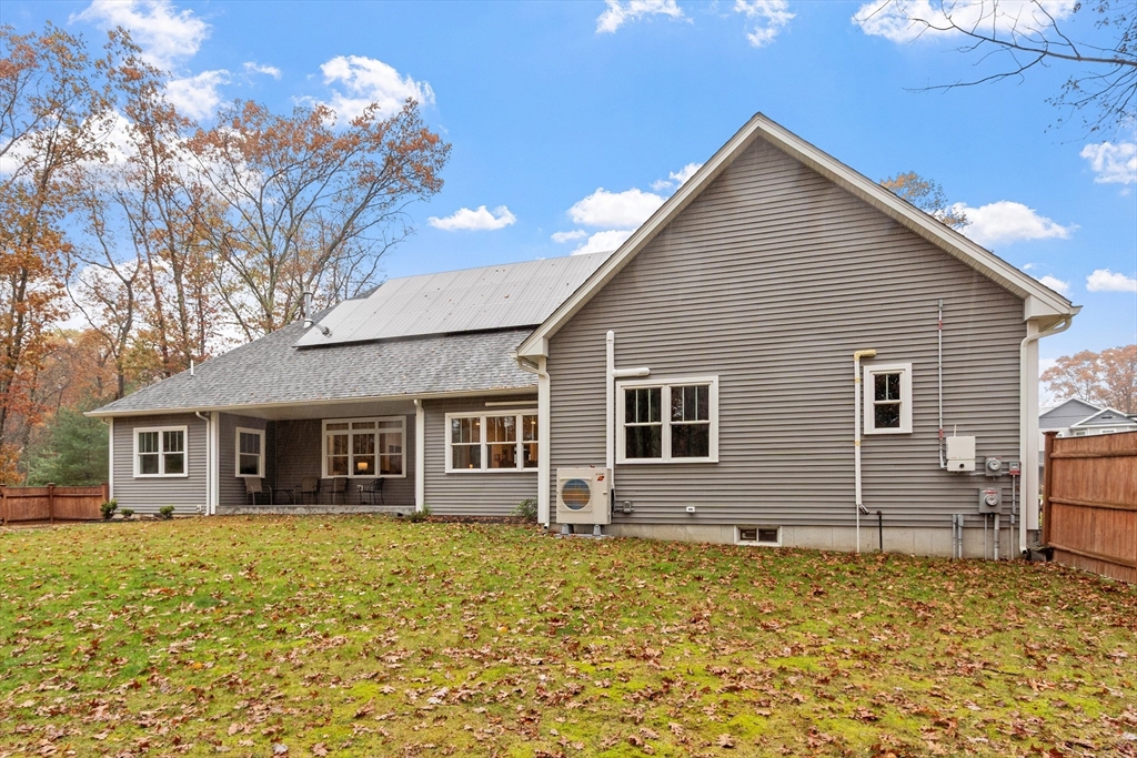 243 Gates Pond Road Berlin, MA 01503 - Photo 38 of 40 a view of a house with a yard