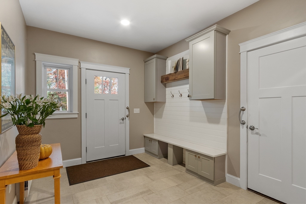 243 Gates Pond Road Berlin, MA 01503 - Photo 4 of 40 a view of an entryway with wooden floor