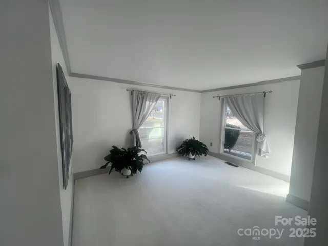 a room with furniture and a window