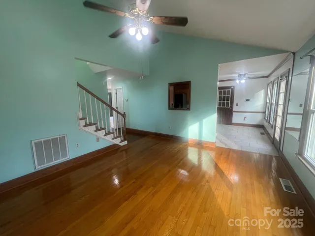 a view of a livingroom with wooden floor