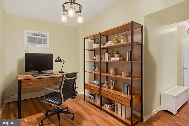 a view of a workspace with furniture