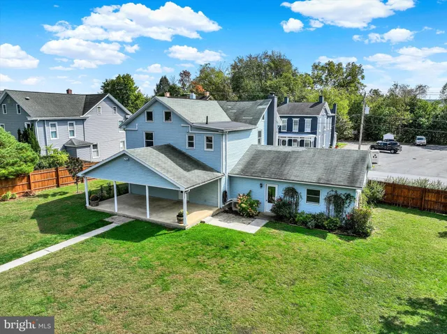 an aerial view of a house with garden