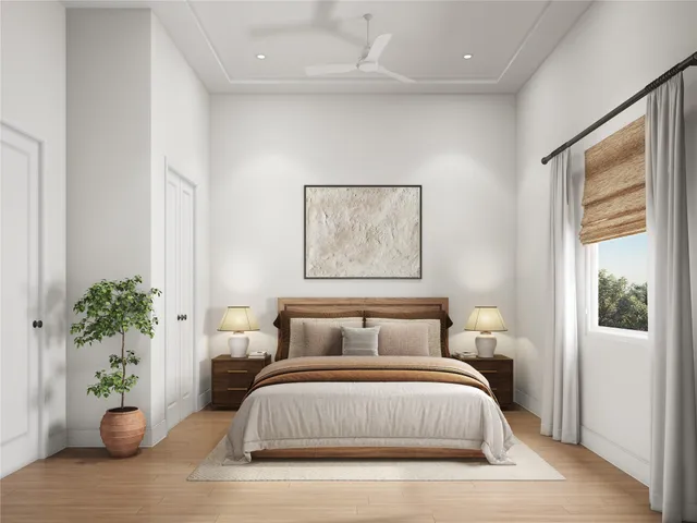 a spacious bedroom with a bed and glass window