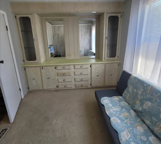 a bathroom with a double vanity sink and mirror