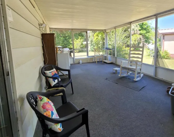 a room with furniture and a window