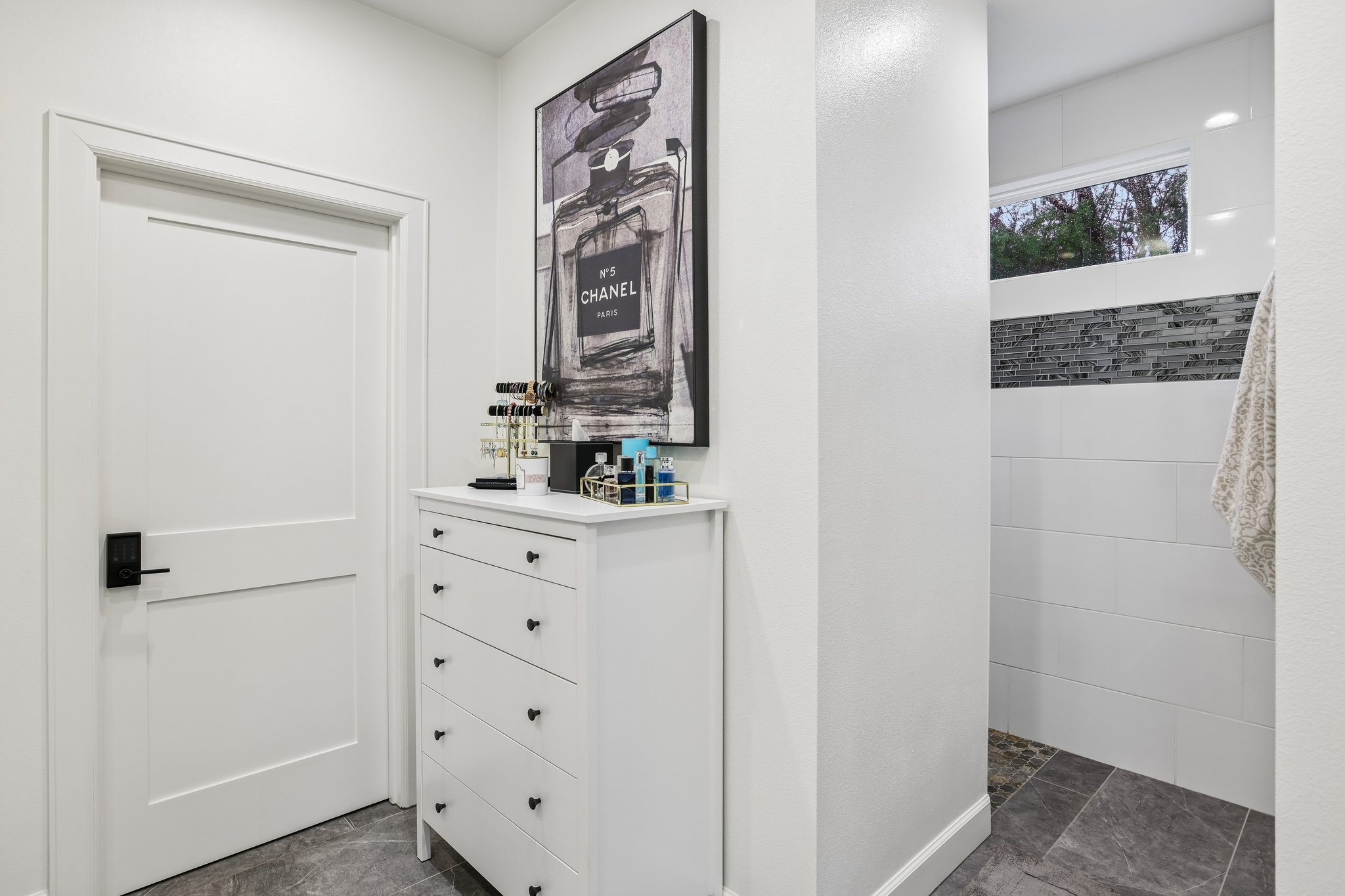 113 Crystal Lane Georgetown, TX 78633 - Photo 19 of 32 A well-appointed dressing area provides convenient storage next to a contemporary shower.