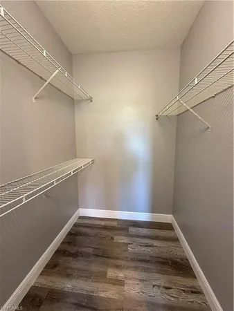 a view of a room with racks on the wall