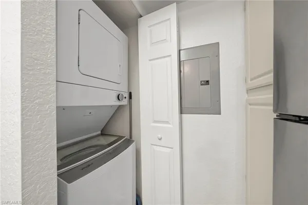 a utility room with cabinets