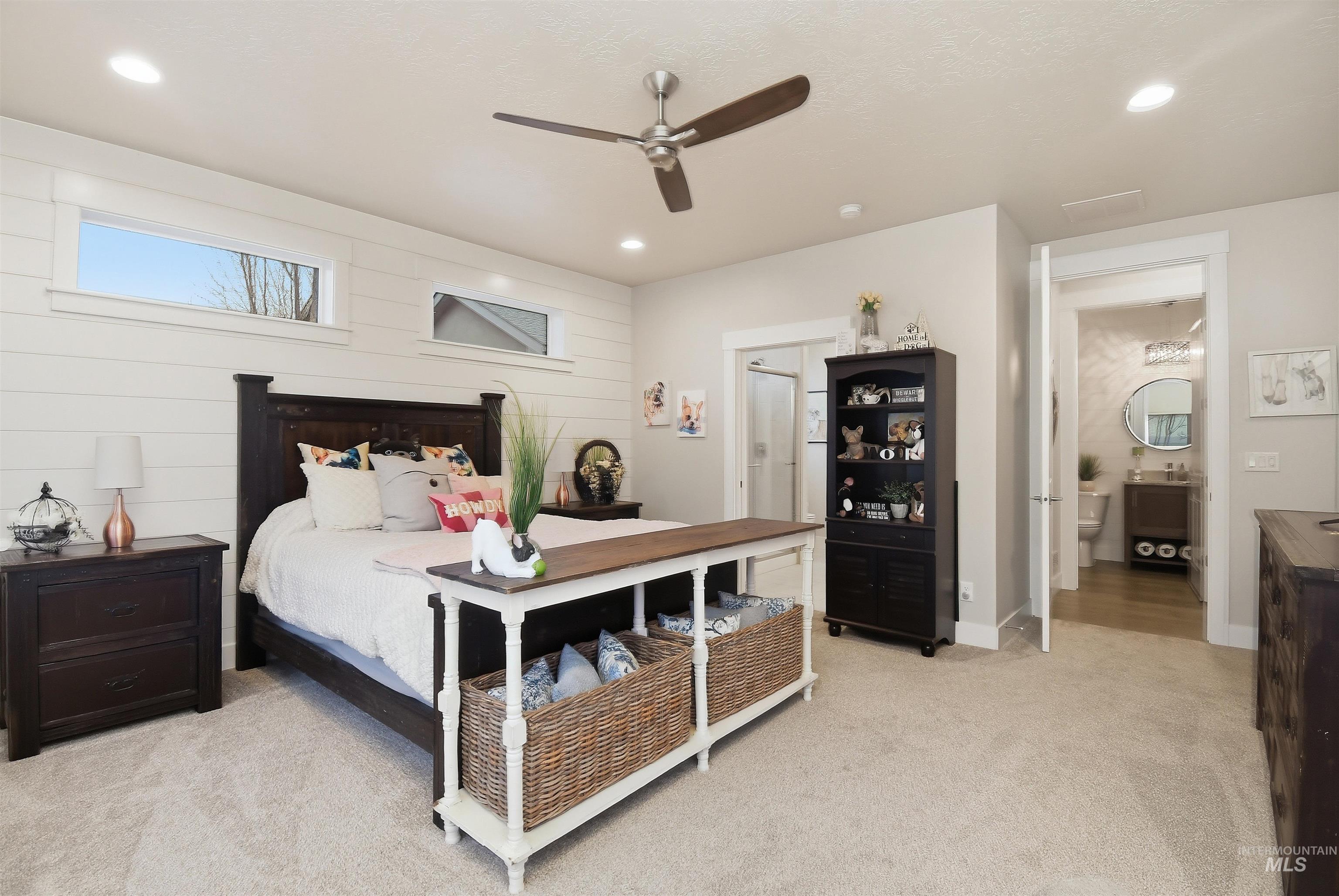 12174 West Lacerta Street Star, ID 83669 - Photo 31 of 49 Bedroom with light colored carpet, recessed lighting, a ceiling fan, and wood walls