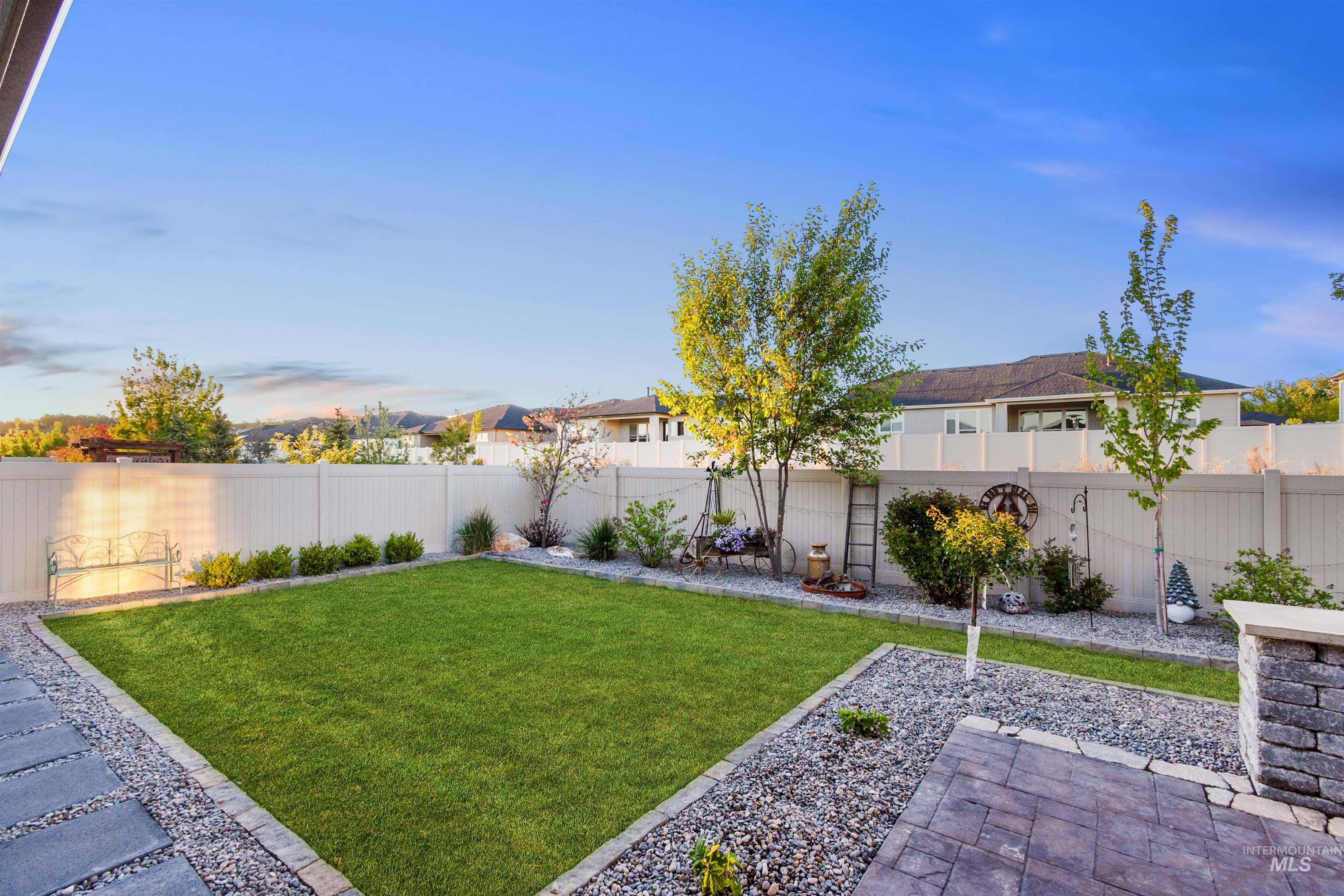 12174 West Lacerta Street Star, ID 83669 - Photo 41 of 49 Fenced backyard featuring a patio