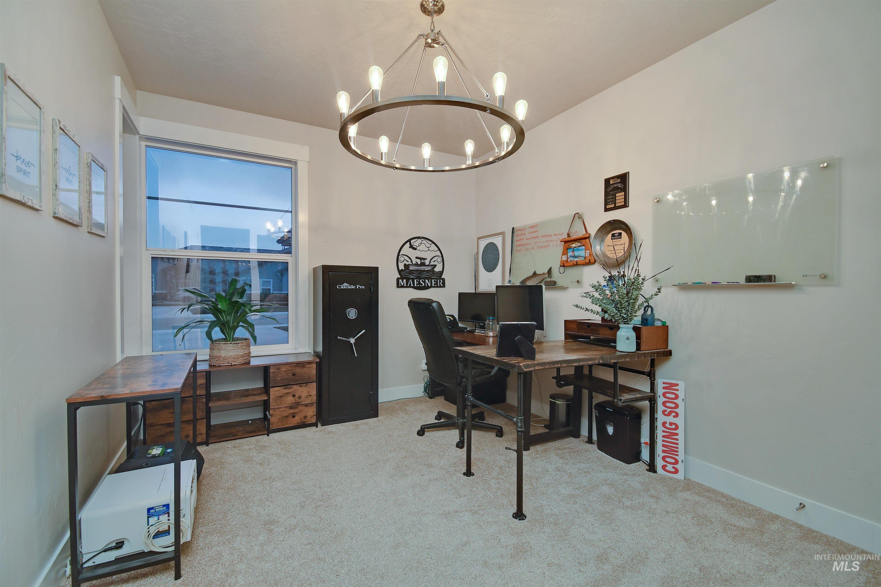 12174 West Lacerta Street Star, ID 83669 - Photo 7 of 49 Office space with light colored carpet and hanging lights