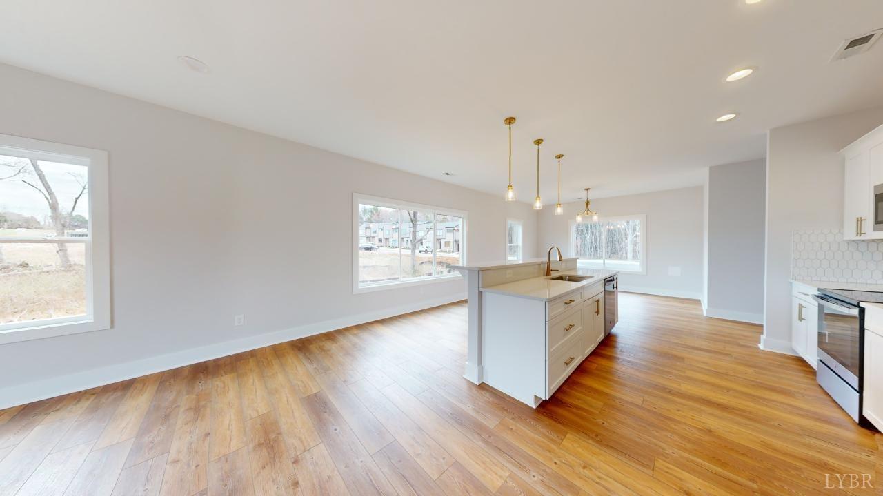 201 Allure Drive Rustburg, VA 24588 - Photo 16 of 46 a large kitchen with lot of wooden floor