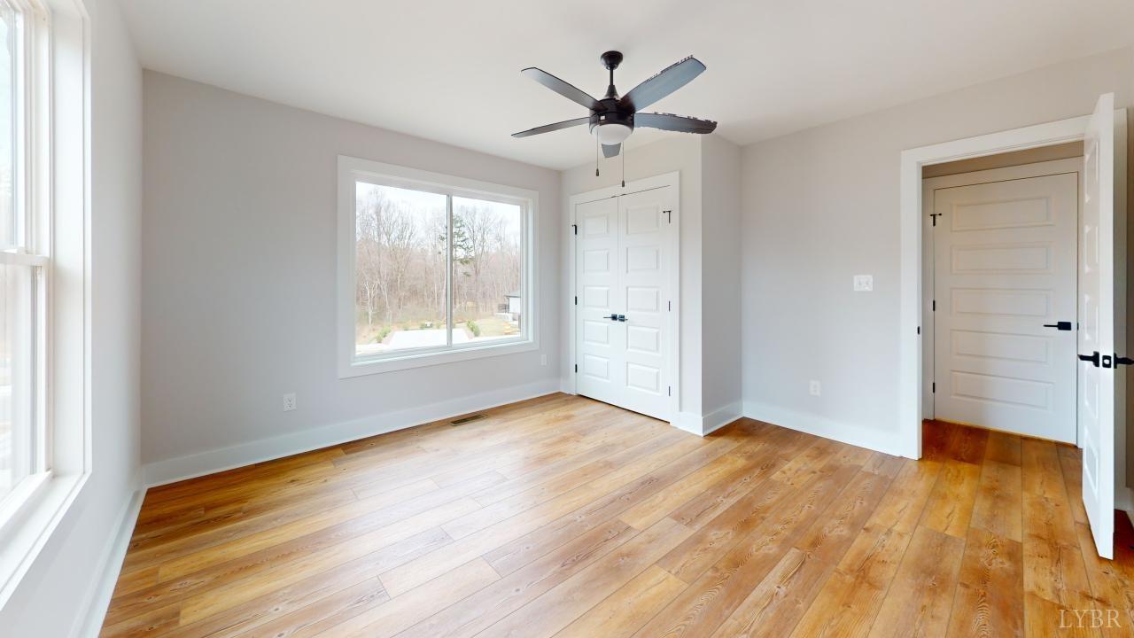 201 Allure Drive Rustburg, VA 24588 - Photo 36 of 46 wooden floor in an empty room with a window