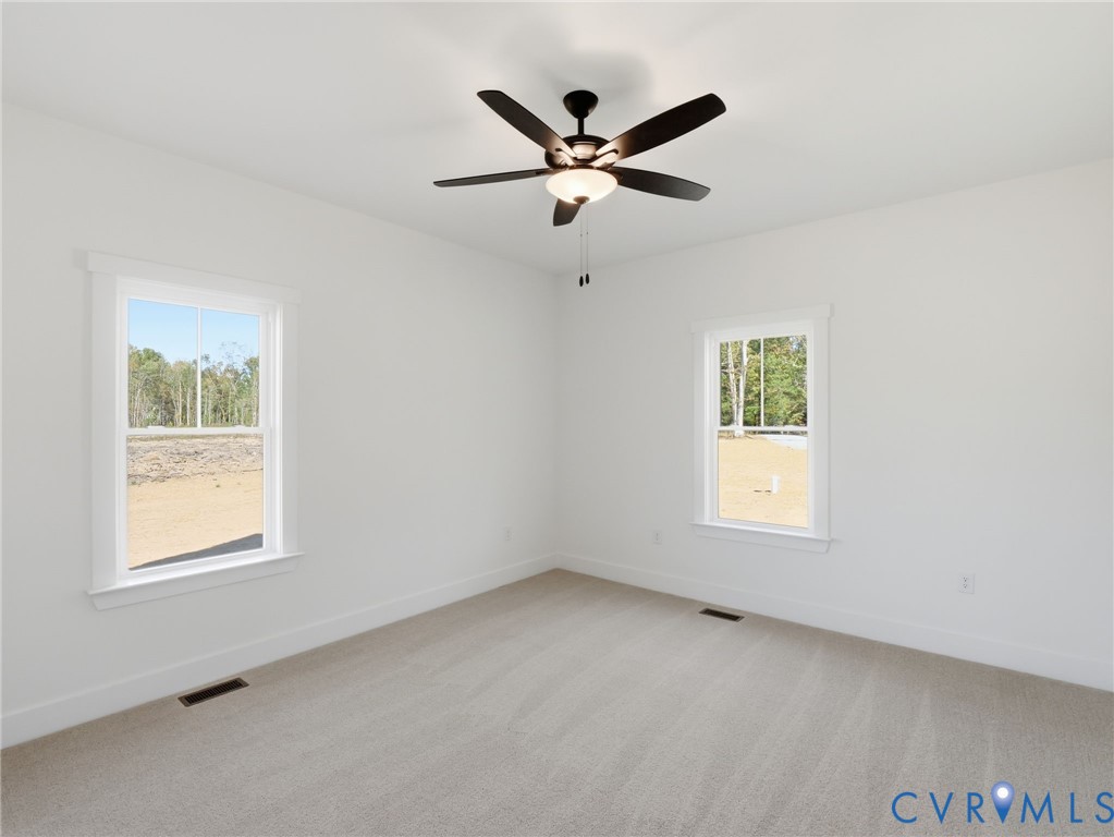 3706 Broad St Road Gum Spring, VA 23065 - Photo 14 of 34 a view of an empty room with a window