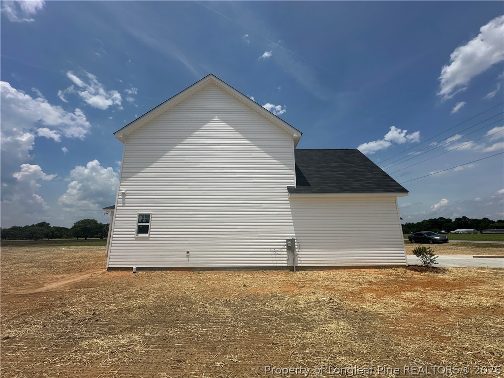 8383 Shannon Road Shannon, NC 28386 - Photo 17 of 17 a view of a house with a yard
