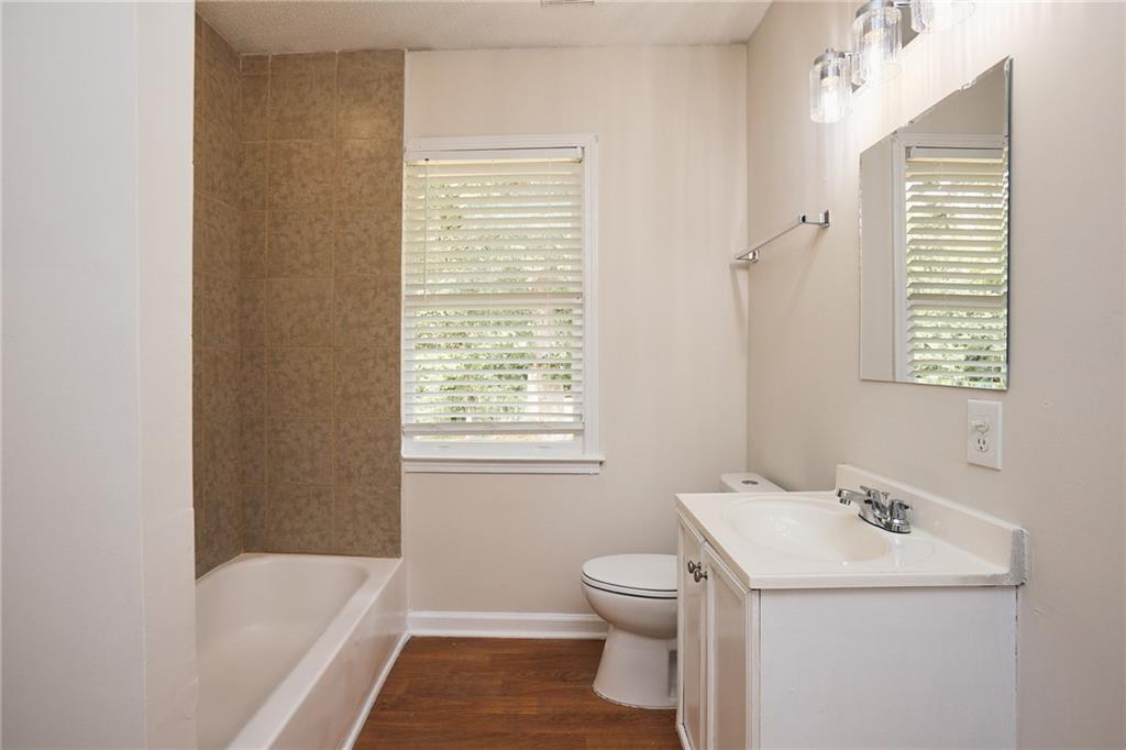 2058 River Road Ellenwood, GA 30294 - Photo 6 of 14 a bathroom with a sink toilet and tub