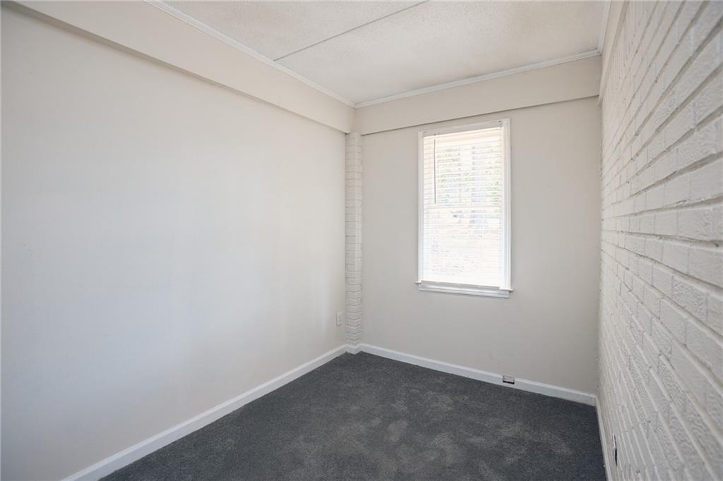 2058 River Road Ellenwood, GA 30294 - Photo 7 of 14 an empty room with a window