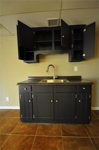 1728 Murfreesboro Road Lebanon, TN 37090 - Photo 14 of 20 a kitchen with a sink and cabinets