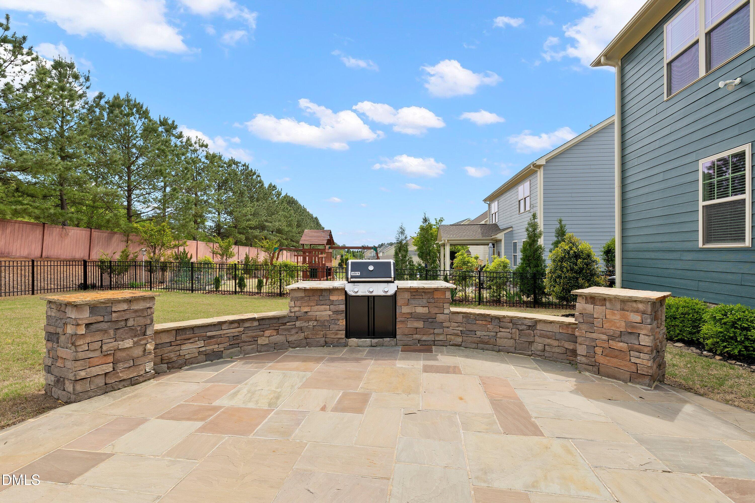 364 Springtime Fields Lane Wake Forest, NC 27587 - Photo 51 of 73 Patio/Outdoor Kitchen