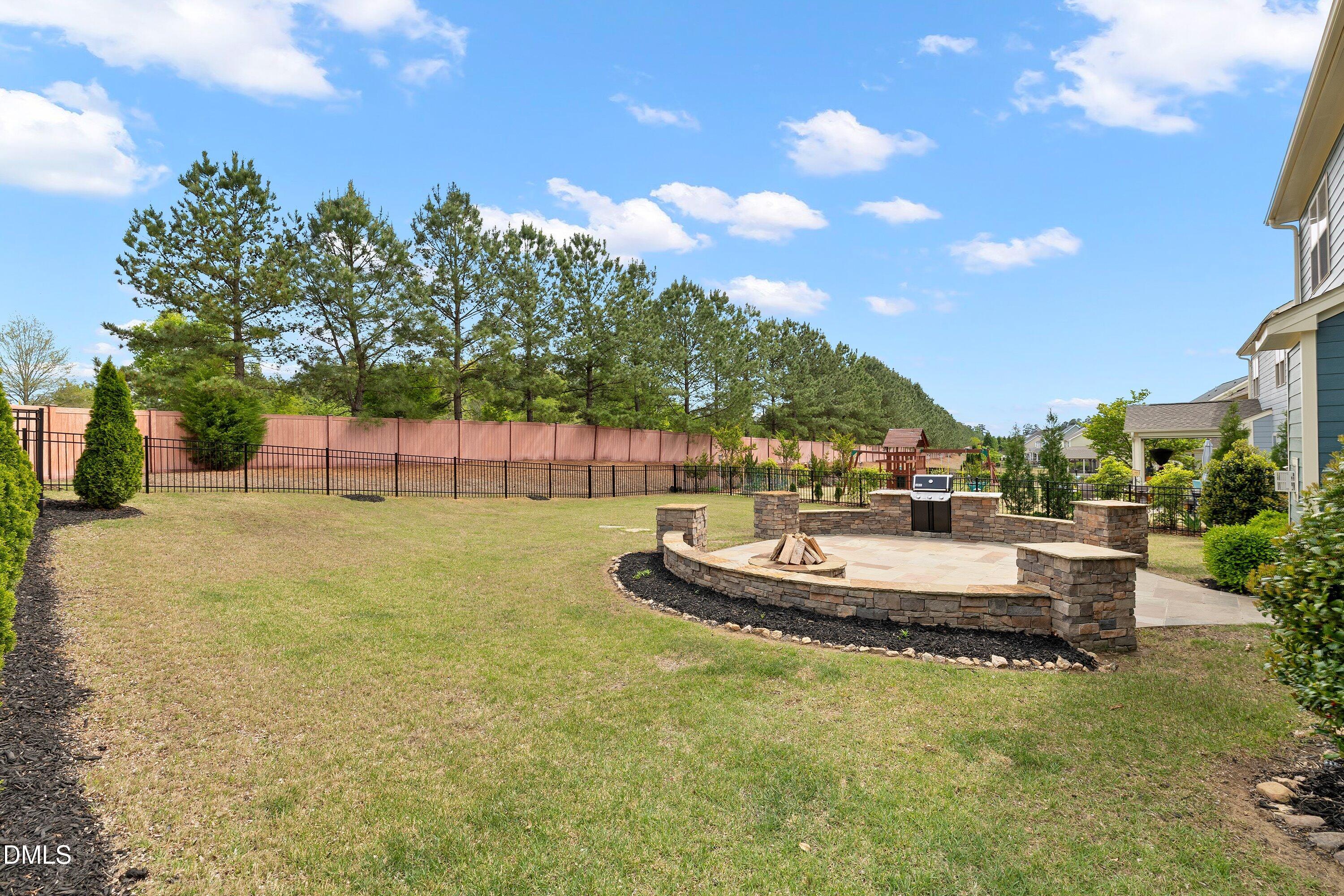 364 Springtime Fields Lane Wake Forest, NC 27587 - Photo 52 of 73 Patio/Outdoor Kitchen