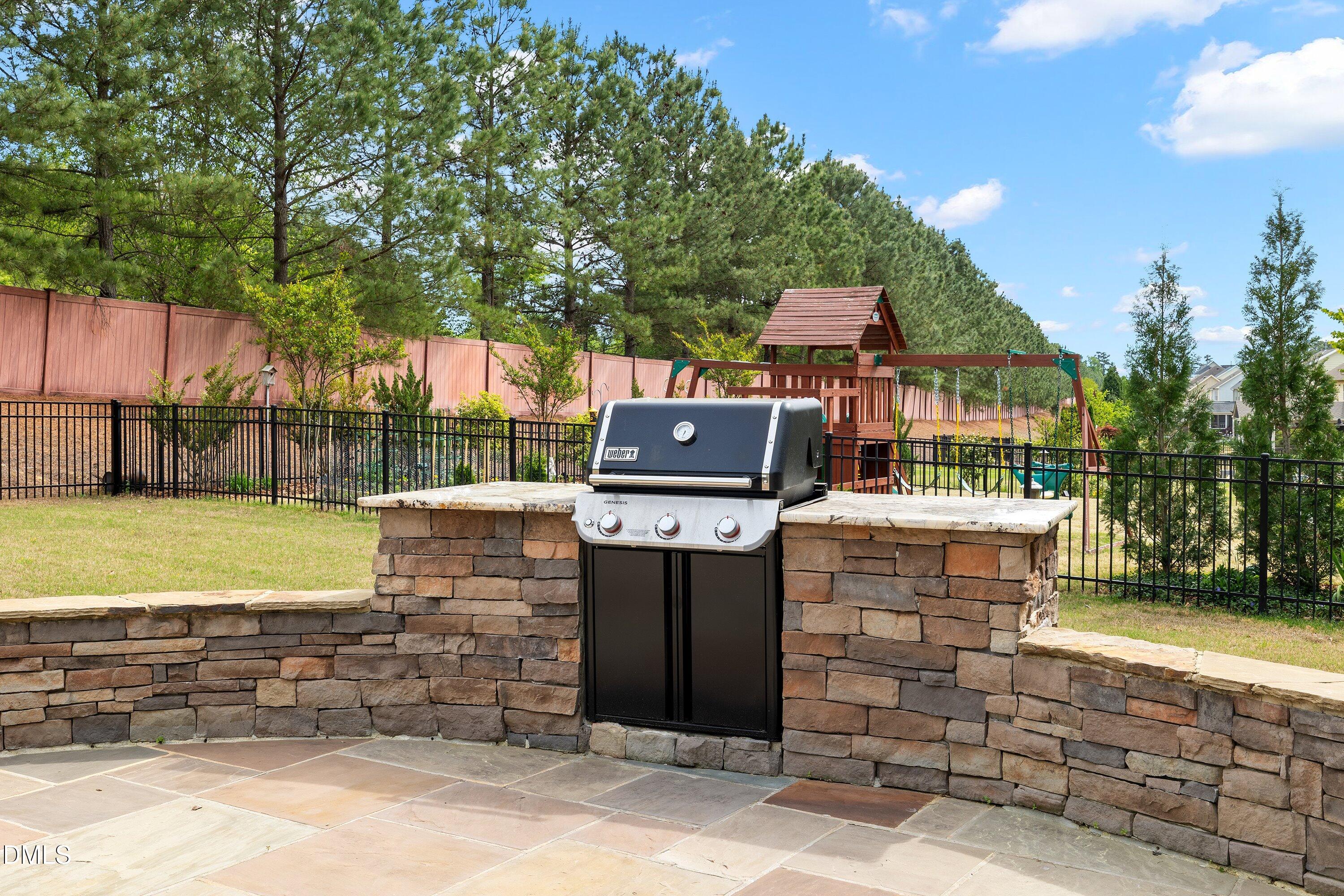 364 Springtime Fields Lane Wake Forest, NC 27587 - Photo 57 of 73 Patio/Outdoor Kitchen