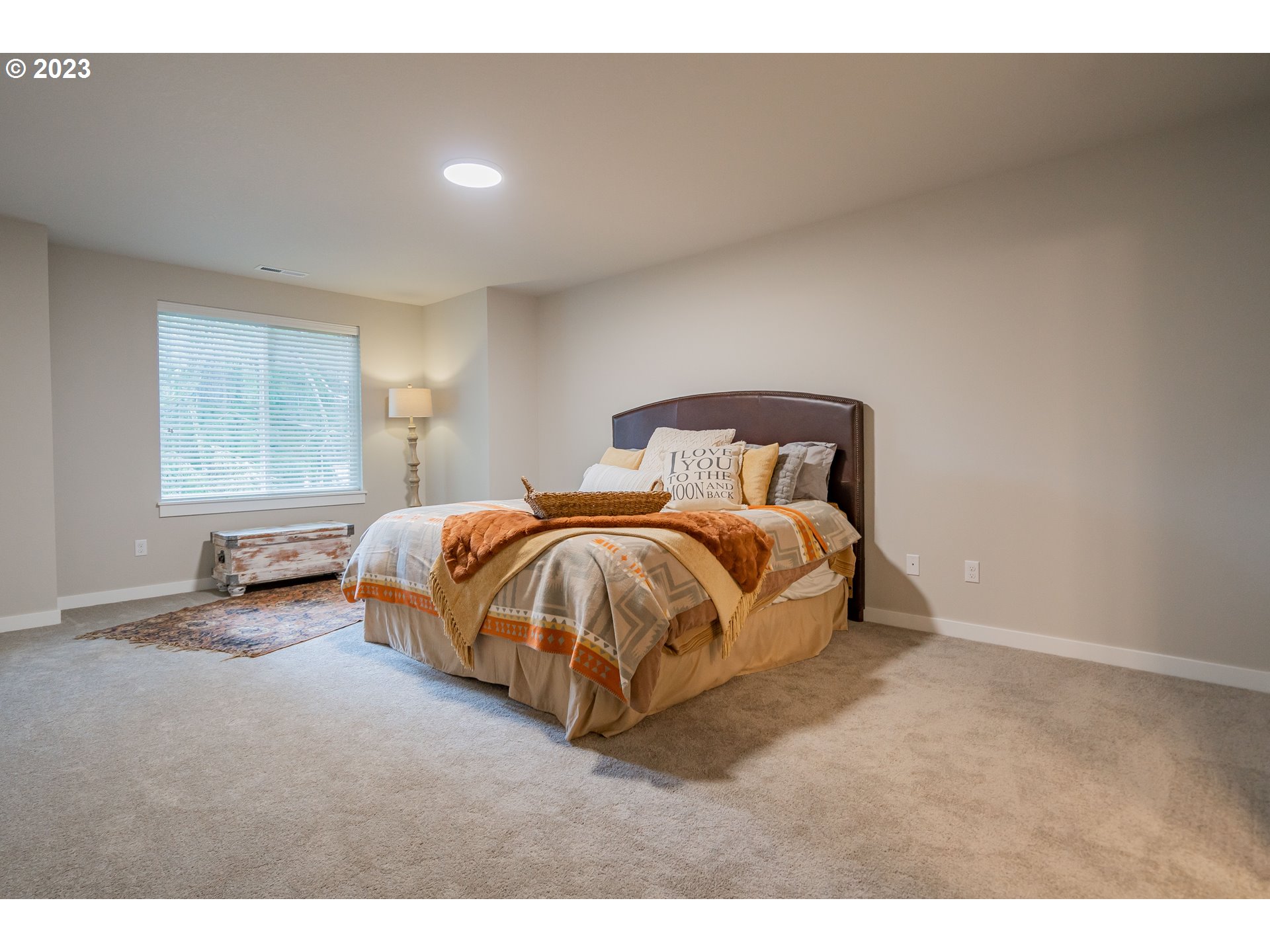 7111 South 13th Street Ridgefield, WA 98642 - Photo 12 of 33 a bedroom with a bed and window
