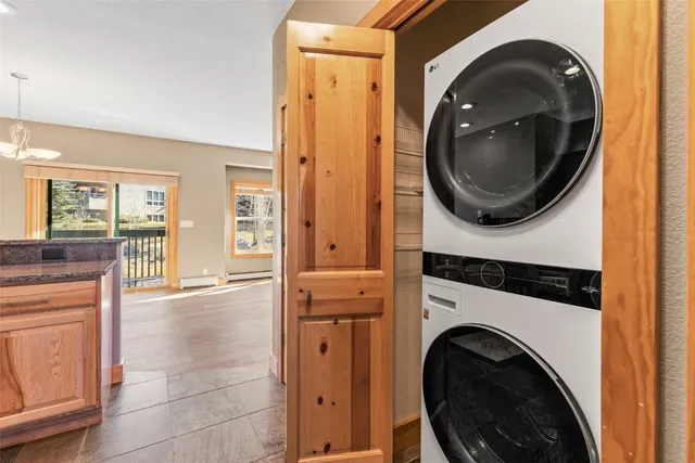 a view of a hallway with washer and dryer