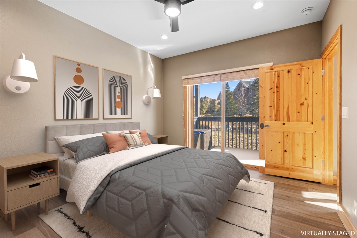 164 Buck Ridge Road, Unit 164 Summit Cove, CO 80435 - Photo 9 of 28 a bedroom with a bed and a window