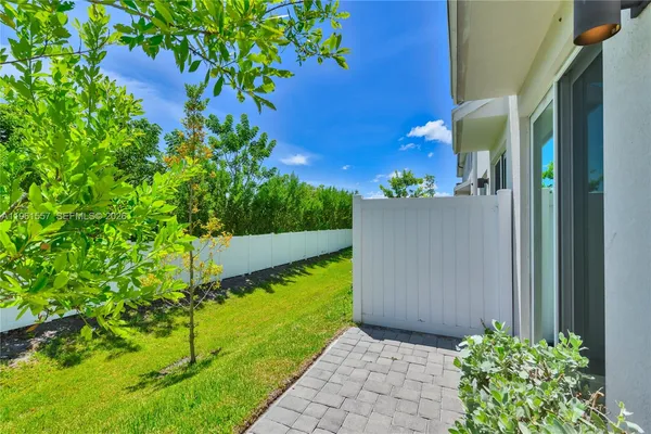 a view of a house with a garden