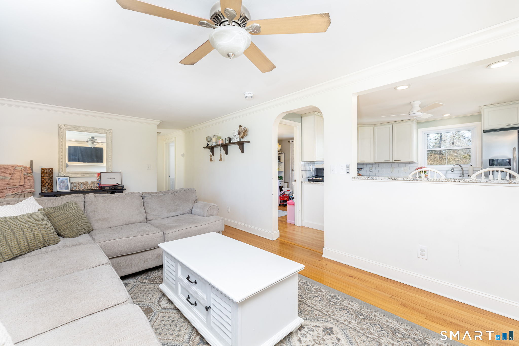 18 Debra Lane Bristol, CT 06010 - Photo 13 of 32 a living room with furniture and a wooden floor