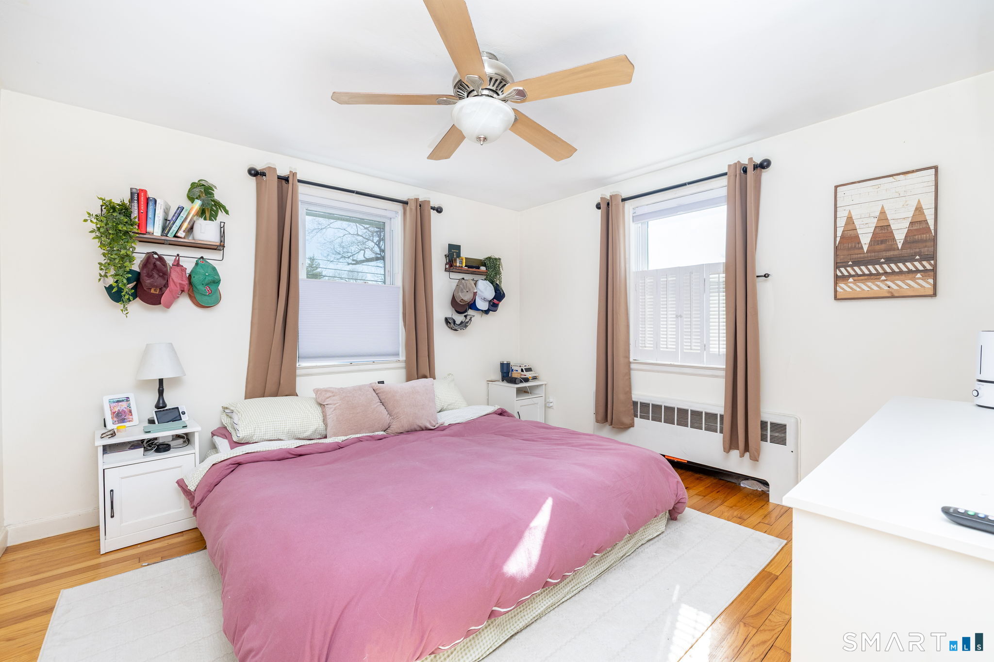 18 Debra Lane Bristol, CT 06010 - Photo 14 of 32 a bedroom with a bed and a window