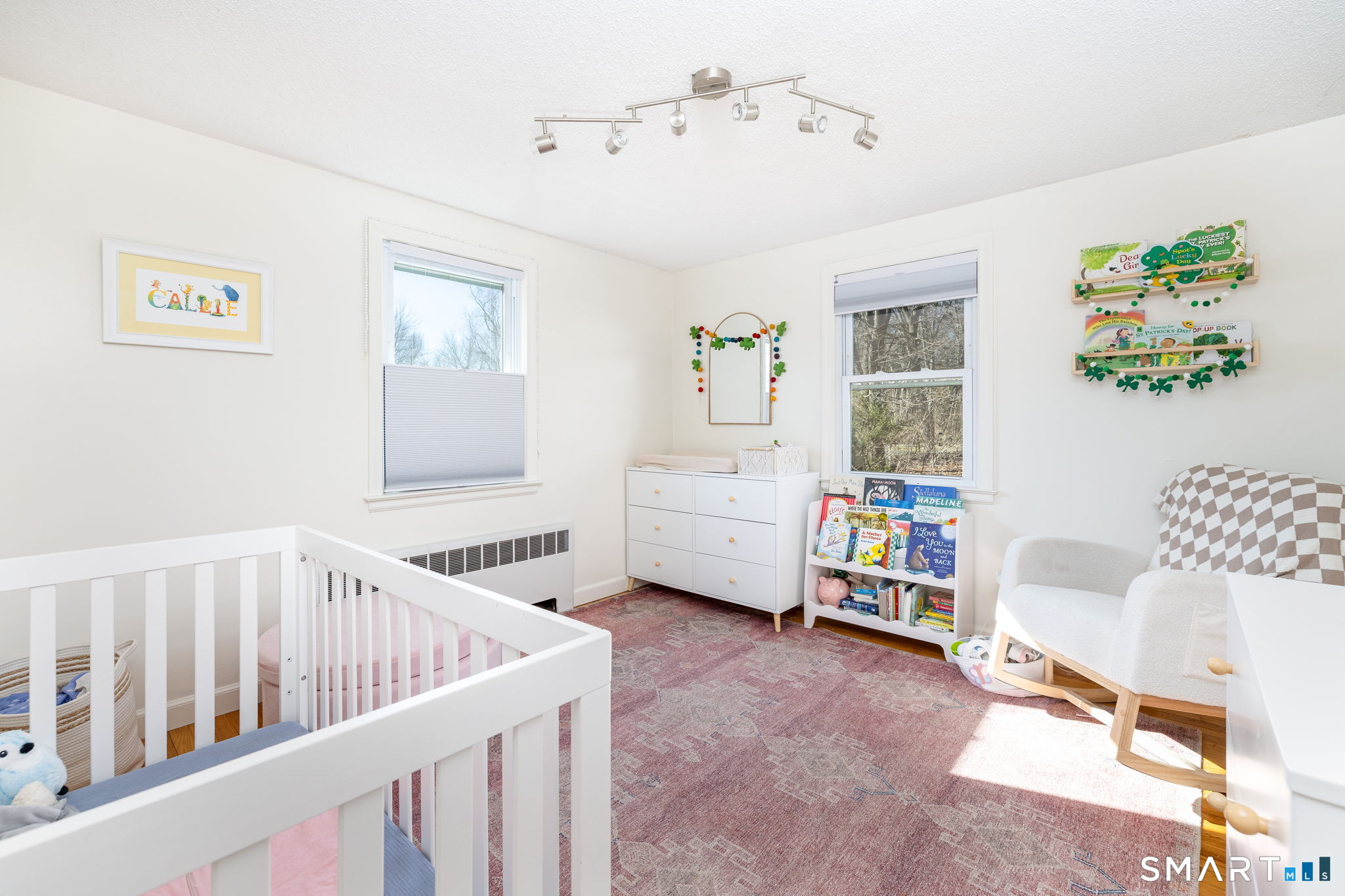 18 Debra Lane Bristol, CT 06010 - Photo 16 of 32 a view of a bedroom with furniture and windows