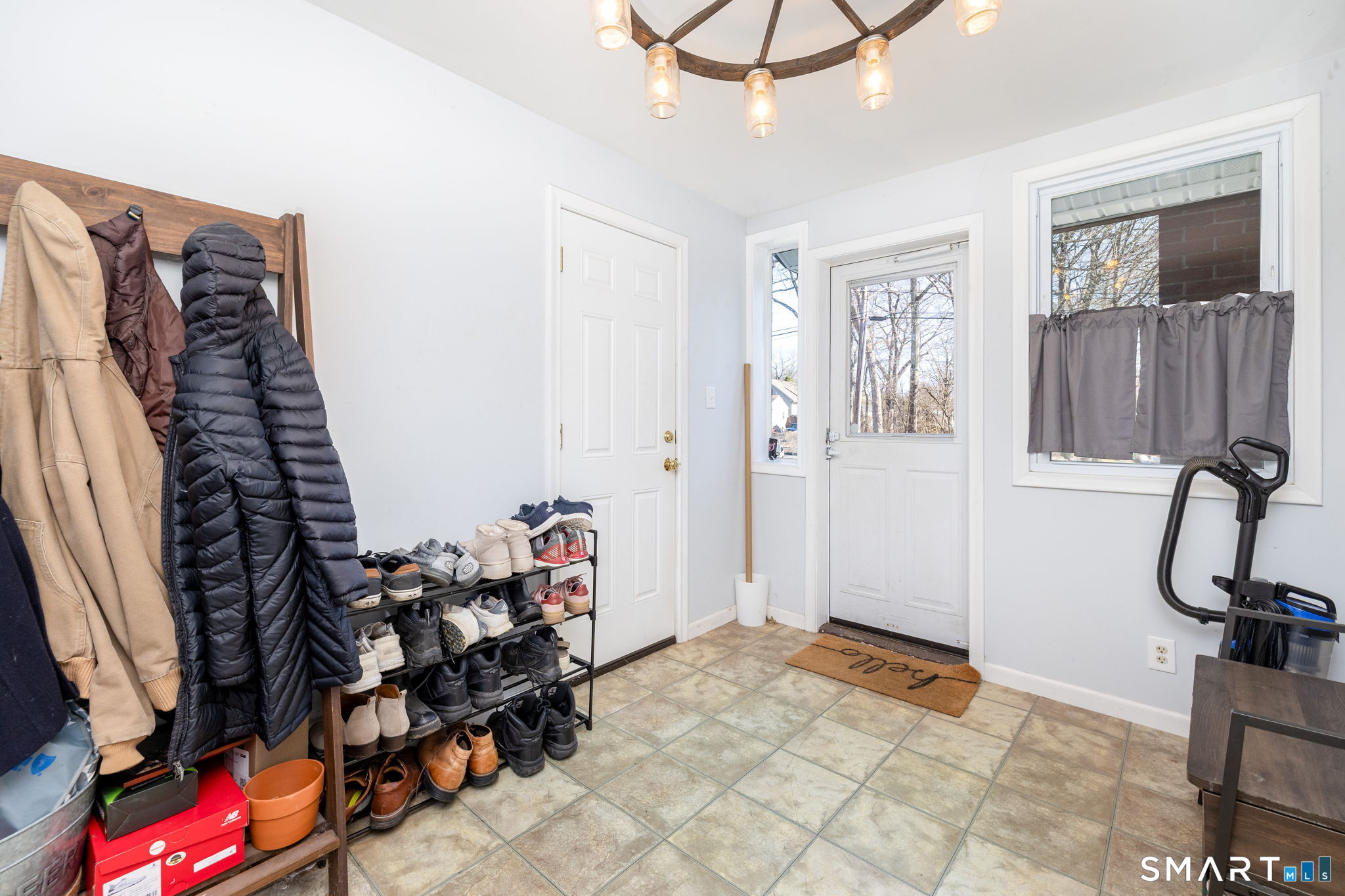 18 Debra Lane Bristol, CT 06010 - Photo 3 of 32 a view of a livingroom with furniture and toys