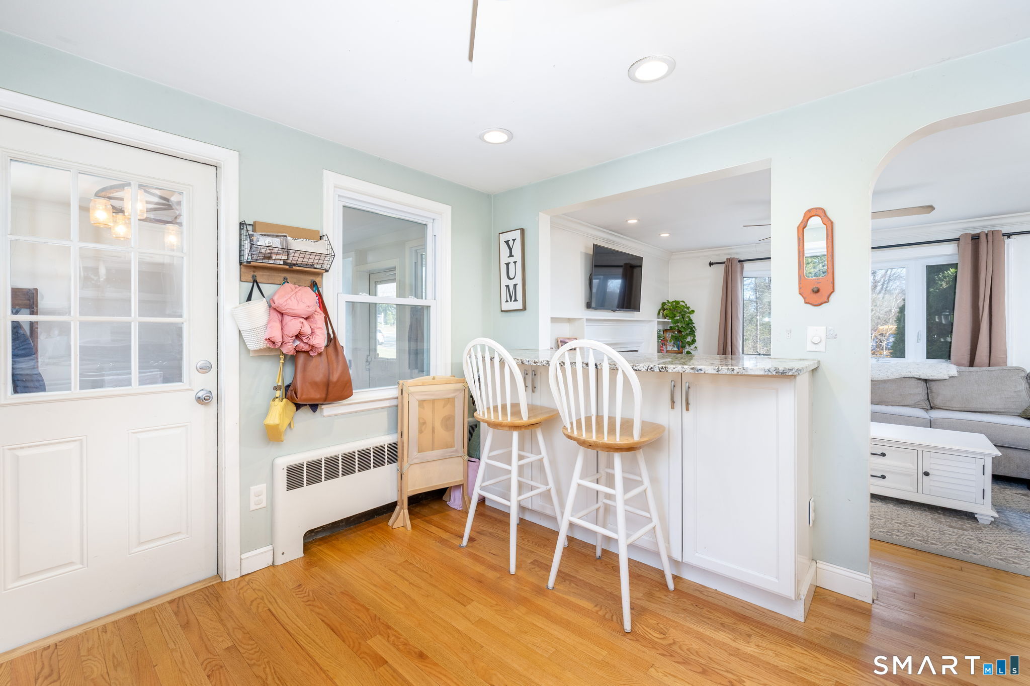 18 Debra Lane Bristol, CT 06010 - Photo 6 of 32 a dining room with furniture and wooden floor