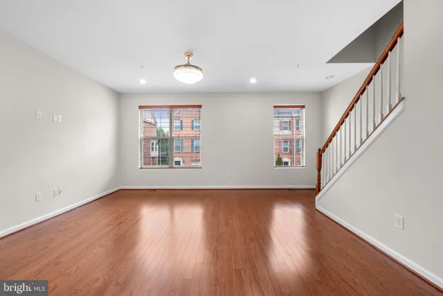 a view of livingroom with hardwood floor and window