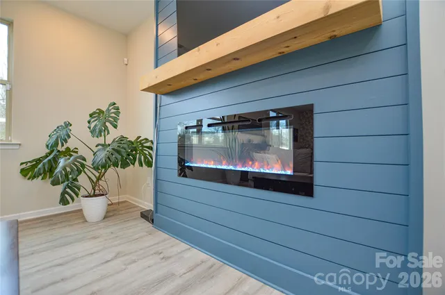 a potted plant sitting on the side of a window