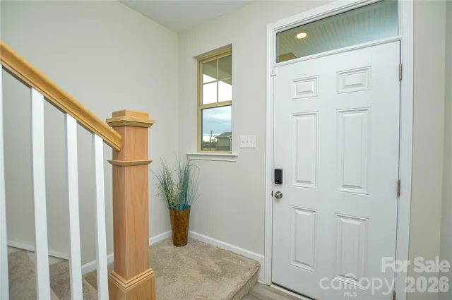 a view of entryway with livingroom