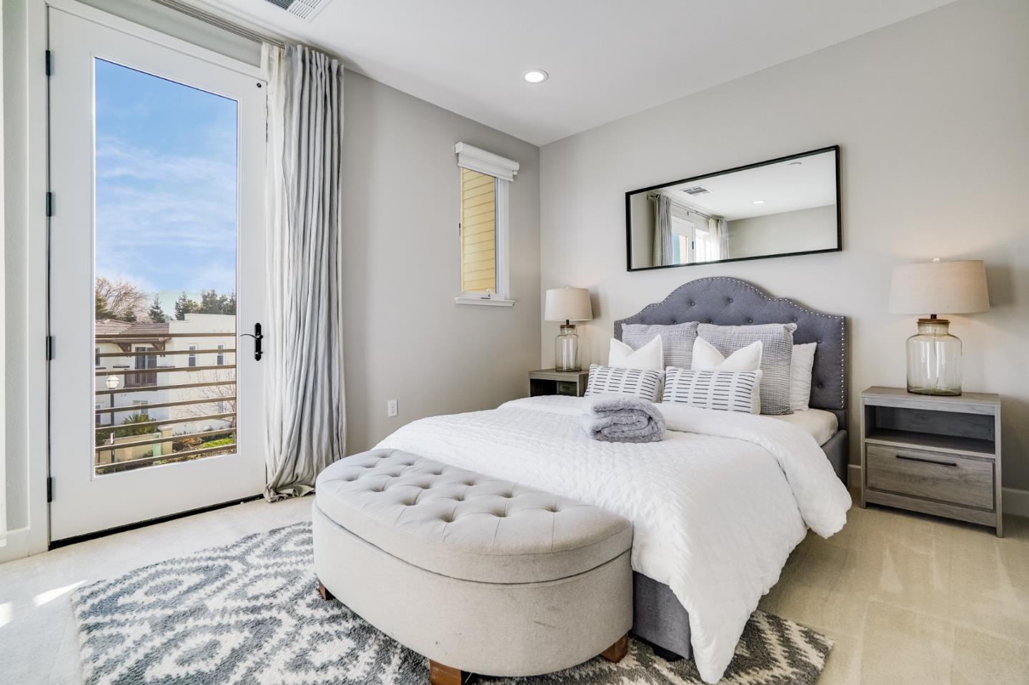 415 Franklin Parkway San Mateo, CA 94403 - Photo 14 of 31 a bedroom with a bed and a painting on the wall