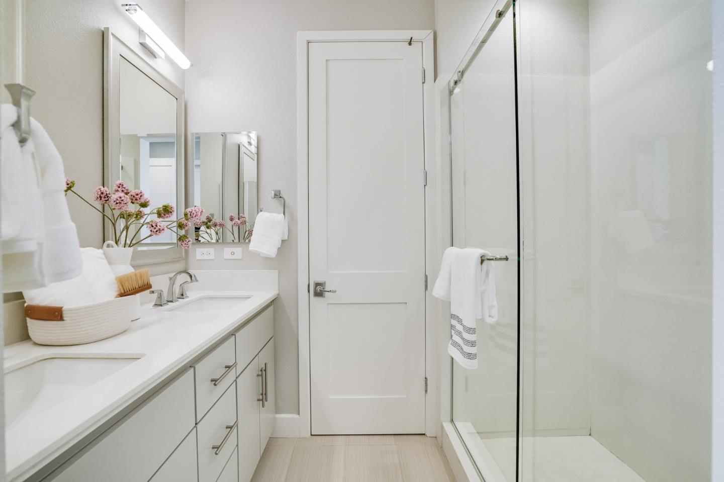 415 Franklin Parkway San Mateo, CA 94403 - Photo 18 of 31 a bathroom with a granite countertop sink and a mirror
