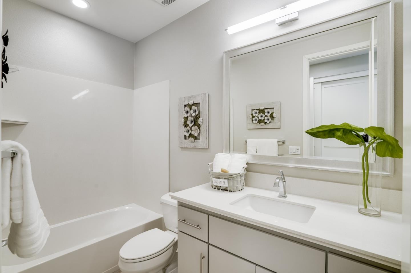 415 Franklin Parkway San Mateo, CA 94403 - Photo 21 of 31 a bathroom with a sink a toilet and a bathtub