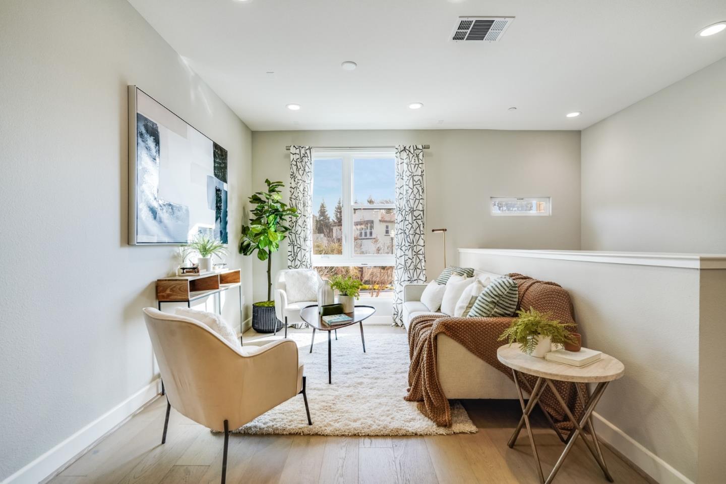 415 Franklin Parkway San Mateo, CA 94403 - Photo 3 of 31 a living room with furniture and wooden floor