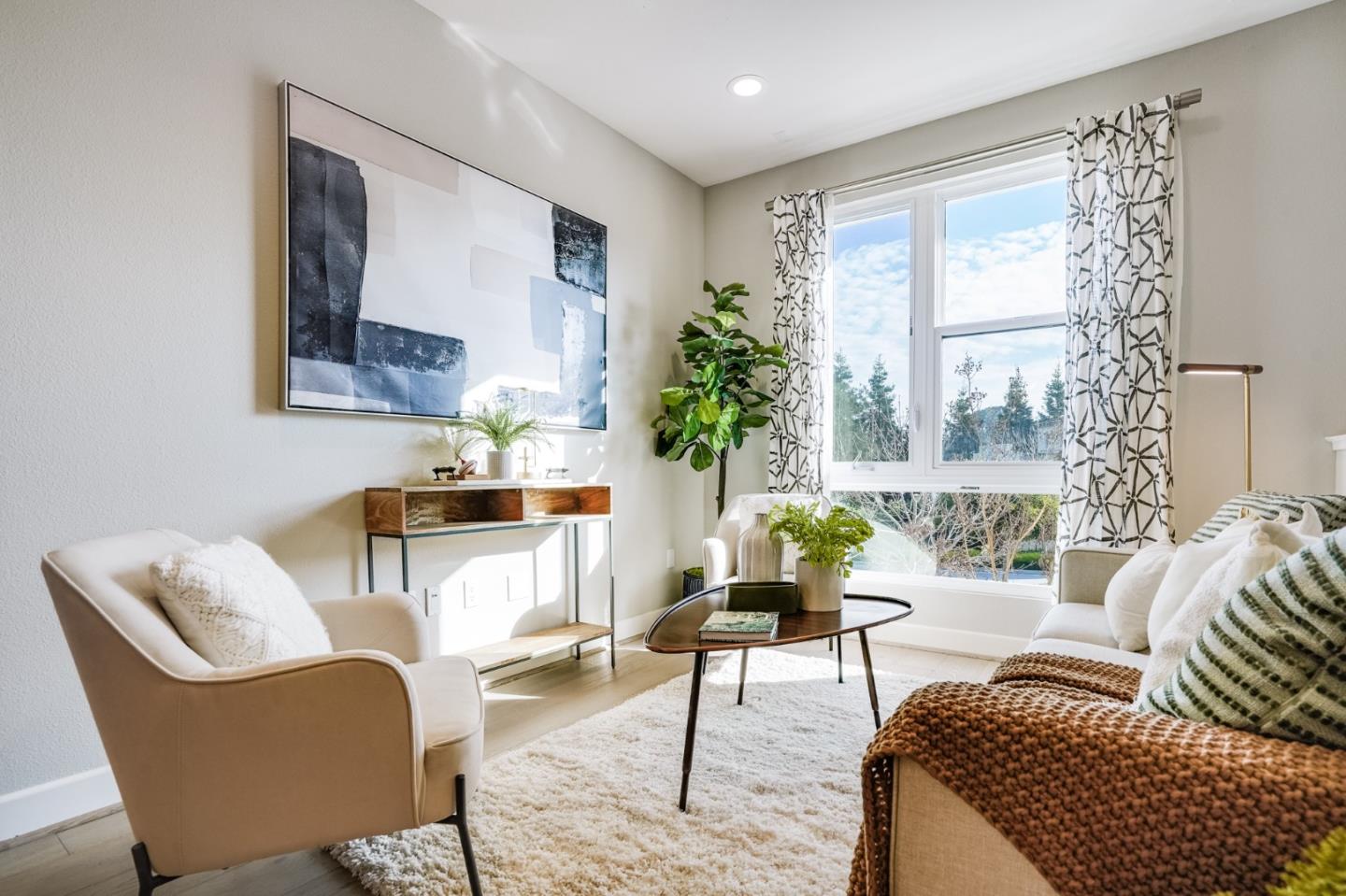 415 Franklin Parkway San Mateo, CA 94403 - Photo 4 of 31 a living room with furniture and a large window