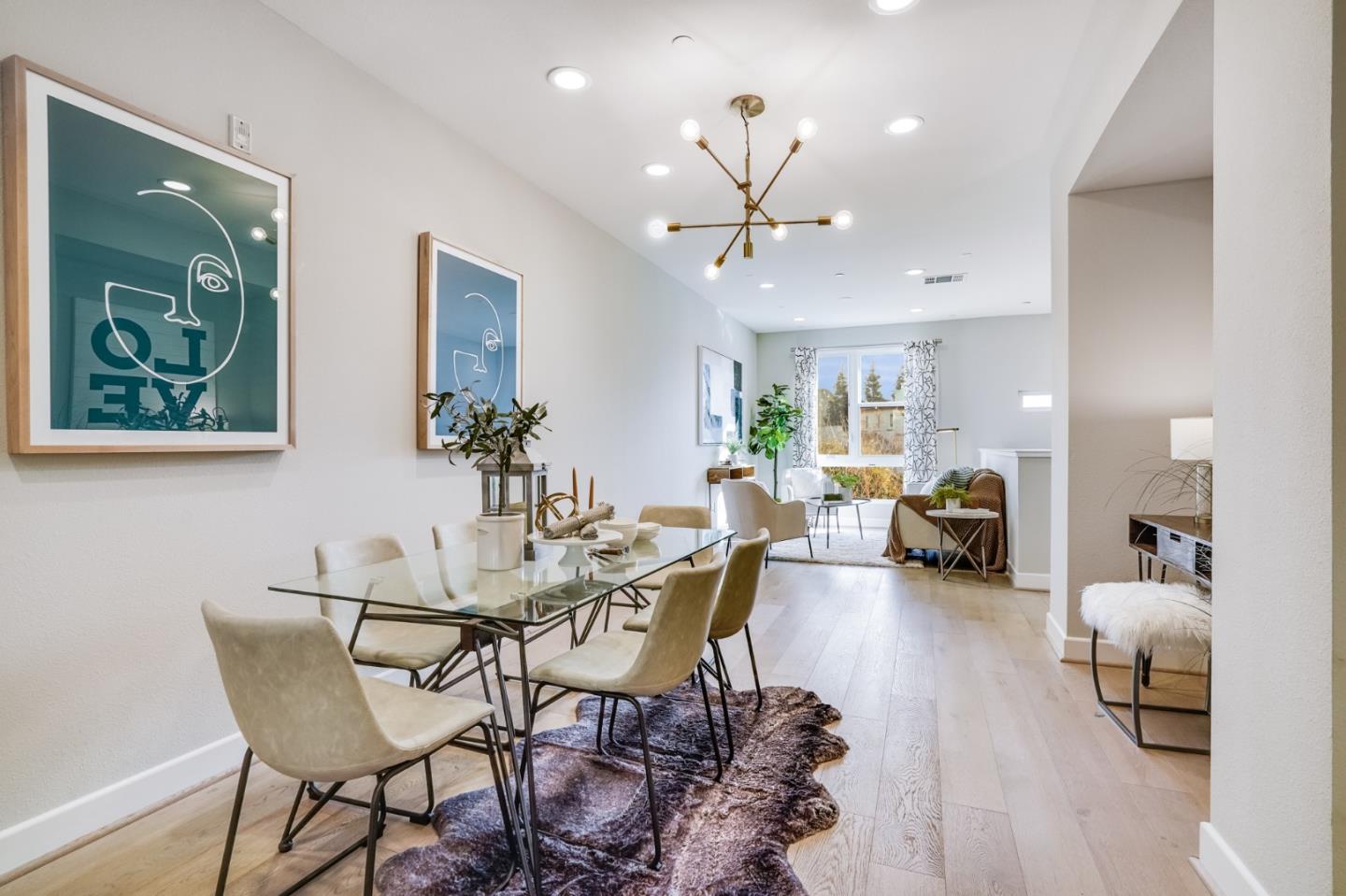 415 Franklin Parkway San Mateo, CA 94403 - Photo 8 of 31 a living room with furniture and a chandelier