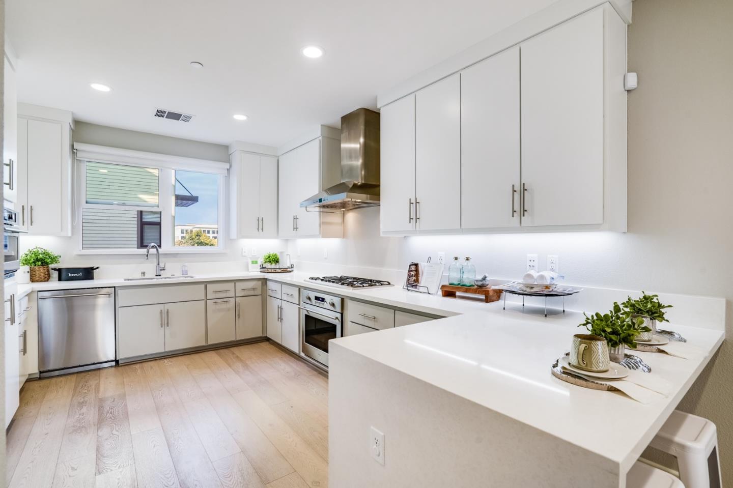 415 Franklin Parkway San Mateo, CA 94403 - Photo 9 of 31 a kitchen with a white cabinets and counter space