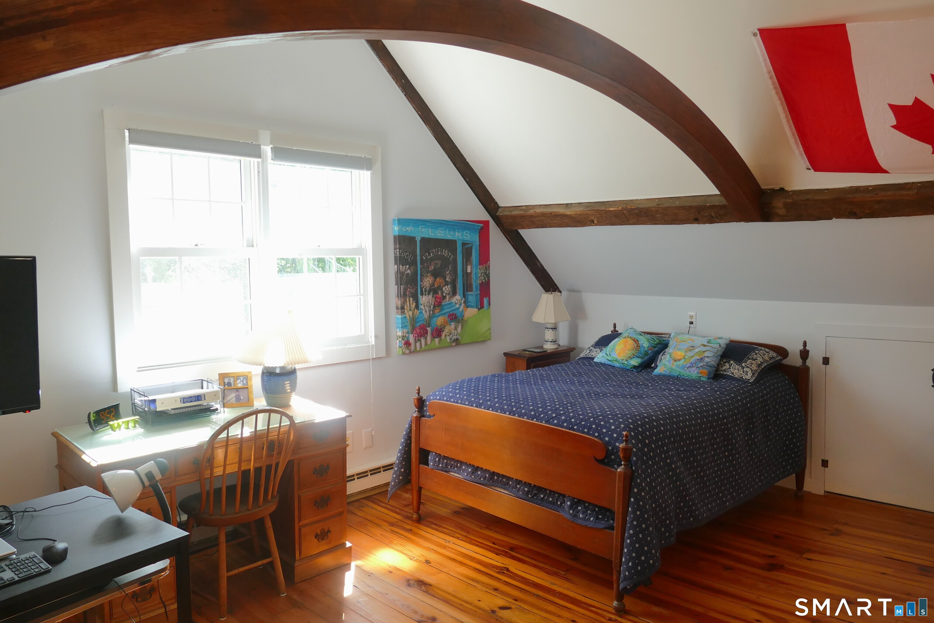 147 Boston Street Guilford, CT 06437 - Photo 25 of 38 a bedroom with furniture and a window