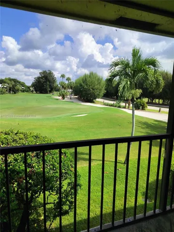 a view of green field with staircase